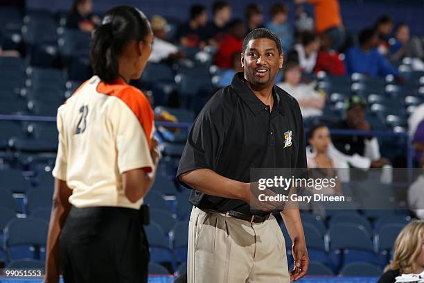 Head coach Steve Kay of the Chicago Sky discusses a call with referee Angelica Suffren during the preseason WNBA game against the Minnesota Lynx on...