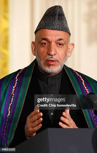 Afghanistan President Hamid Karzai speaks during a joint news conference with U.S. President Barack Obama in the East Room of the White House May 12,...