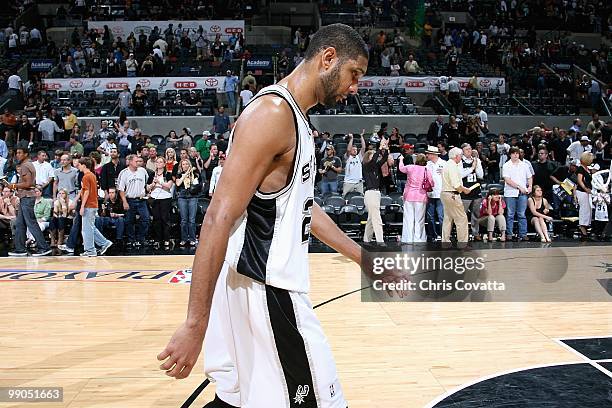 Tim Duncan of the San Antonio Spurs walks off the court after losing to the Phoenix Suns in Game Four of the Western Conference Semifinals during the...