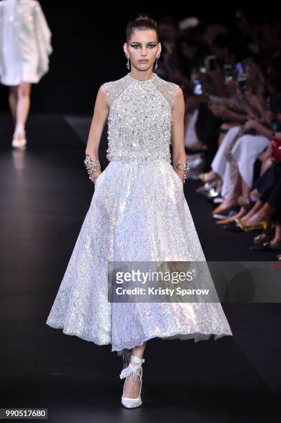 Model walks the runway during the George Hobeika Haute Couture Fall Winter 2018/2019 show as part of Paris Fashion Week on July 2, 2018 in Paris,...