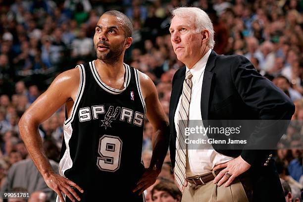 Tony Parker and head coach Gregg Popovich of the San Antonio Spurs look up in Game Five of the Western Conference Quarterfinals against the Dallas...