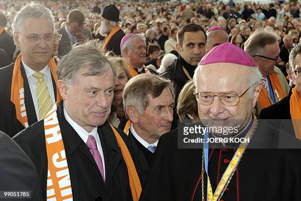 German President Horst Koehler and Robert Zollitsch, head of the Catholic Church in Germany and archbishop of Freiburg, take part in the opening...