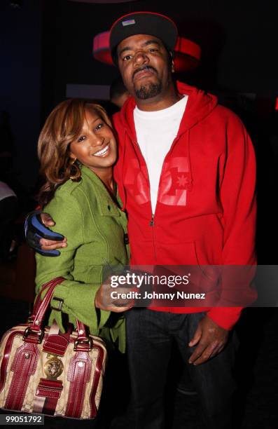 Singer Olivia and radio personality Ed Lover attend Bottles & Strikes at Chelsea Piers on May 11, 2010 in New York City.