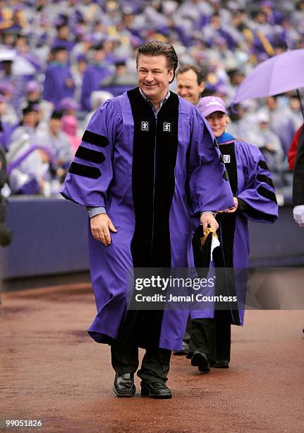 Actor Alec Baldwin walks in the procession of honoree's and guest during the 2010 New York University Commencement at Yankee Stadium on May 12, 2010...