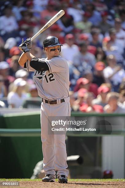 Cody Ross of the Florida Marlins prepares to take a swing during a baseball game against the Washington Nationals on May 8, 2010 at Nationals Park in...