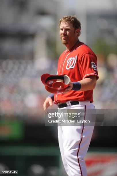 Adam Dunn of the Washington Nationals looks on during a baseball game against the Florida Marlins on May 8, 2010 at Nationals Park in Washington, D.C.