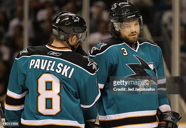 Joe Pavelski of the San Jose Sharks speaks with Douglas Murray against the Detroit Red Wings in Game Five of the Western Conference Semifinals during...