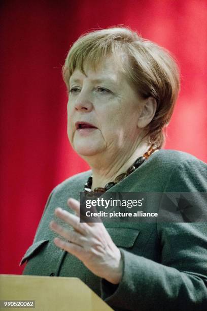 German Chancellor Angela Merkel delivers a speech during the New Year's Reception of the state counsil of the district Vorpommern-Ruegen in...