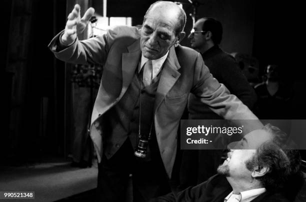 Spanish director Luis Bunuel directs French actress Carole Bouquet and Spanish actor Fernando Rey during the filming of "That Obscure Object of...