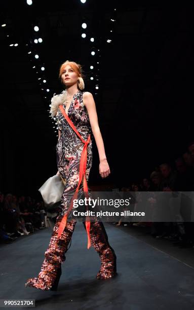 Model walks the runway during the show of Dawid Tomaszewski at the E-Werk during the Berlin Fashion Week in Berlin, Germany, 15 January 2018. In the...