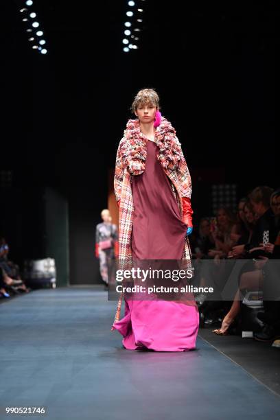 Model walks the runway during the show of Dawid Tomaszewski at the E-Werk during the Berlin Fashion Week in Berlin, Germany, 15 January 2018. In the...