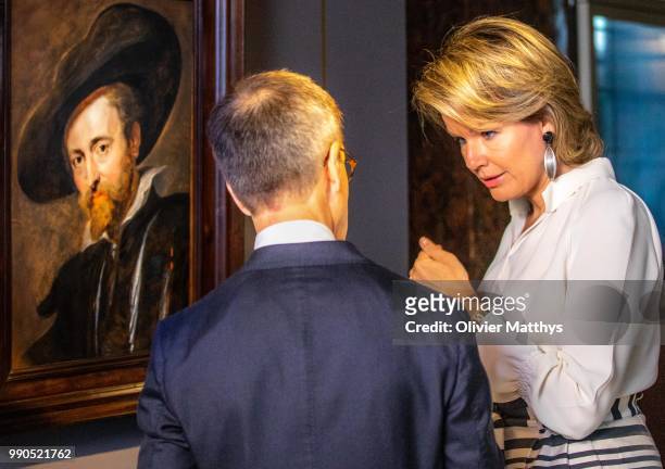 The Rubens House conservator shows Queen Mathilde of Belgium the iconic Peter Paul Rubens's self-portrait in The Master Lives exhibition on July 3,...