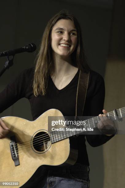 Singer-songwriter Liz Carlisle performs at a benefit concert for South Shore Habitat for Humanity at the Mozaic Room Coffeehouse in the Avon Baptist...