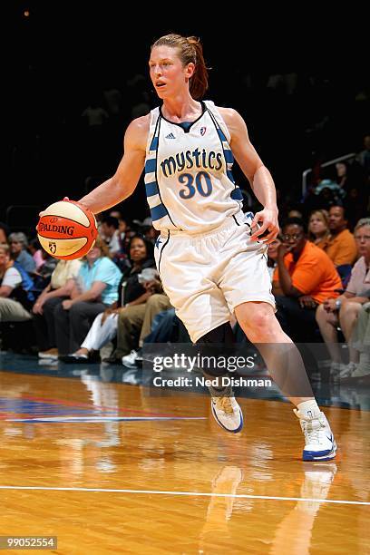 Katie Smith of the Washington Mystics drives the ball up court during the WNBA preseason game against the New York Liberty on May 5, 2010 at the...