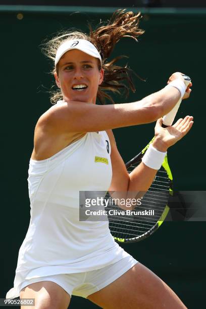 Johanna Konta of Great Britain returns against Natalia Vikhlyantseva of Russia during their Ladies' Singles first round match on day two of the...