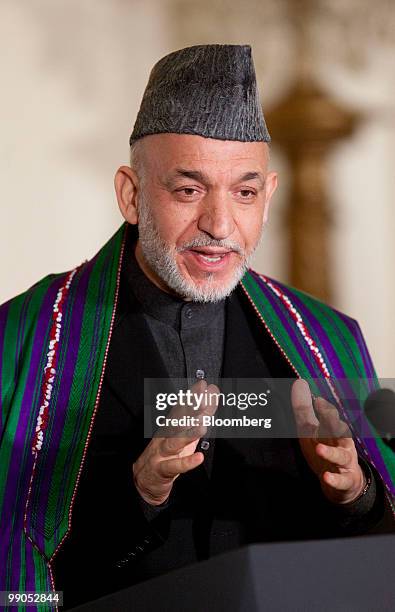 Hamid Karzai, Afghanistan's president, speaks during a joint news conference with U.S. President Barack Obama in the East Room of the White House in...