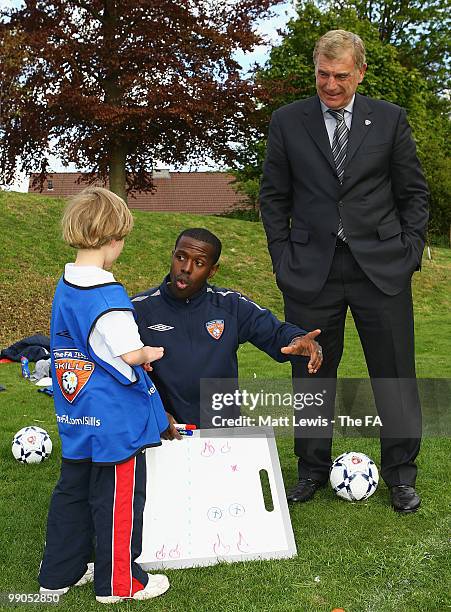 Sir Trevor Brooking looks on during the UEFA Grassroots Football Day at Saffron Walden County High School on May 12, 2010 in Saffron Walden, England.