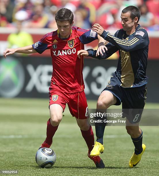 Midfielder Will Johnson of Real Salt Lake fights for the ball against Andrew Jacobson of the Philadelphia Union during an MLS soccer game on May 8,...