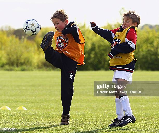 Children in action during the UEFA Grassroots Football Day at Saffron Walden County High School on May 12, 2010 in Saffron Walden, England.