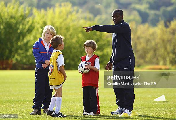 Children are coached during the UEFA Grassroots Football Day at Saffron Walden County High School on May 12, 2010 in Saffron Walden, England.