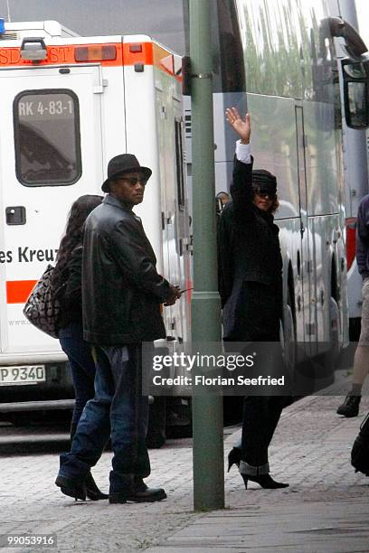 Singer Whitney Houston and crew members arrive at the O2 World in front of the backstage entrance on May 12, 2010 in Berlin, Germany.