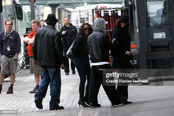 Singer Whitney Houston and crew members arrive at the O2 World in front of the backstage entrance on May 12, 2010 in Berlin, Germany.