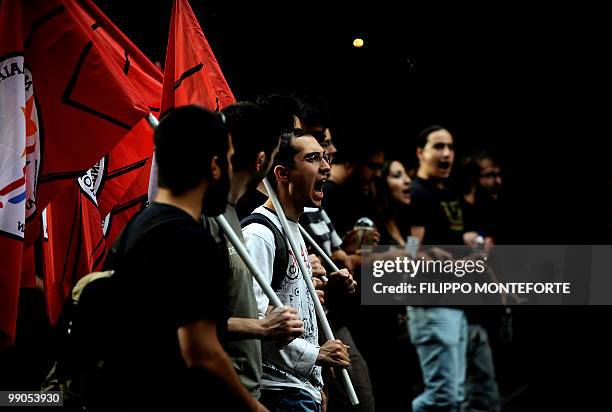 Demonstrators shout slogans during a march in central Athens on May 12, 2010. Greece was to receive a first dose of 5.5 billion euros from the IMF...