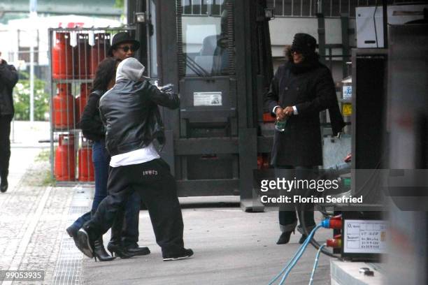 Singer Whitney Houston and crew members arrive at the O2 World in front of the backstage entrance on May 12, 2010 in Berlin, Germany.