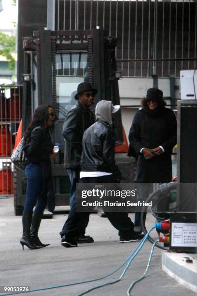 Singer Whitney Houston and crew members arrive at the O2 World in front of the backstage entrance on May 12, 2010 in Berlin, Germany.