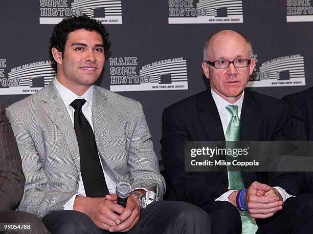 New York Jets quarterback Mark Sanchez and New York Jets Chairman & CEO Woody Johnson attend the New York Giants and Jets send-off ceremony for the...