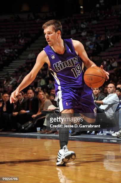 Beno Udrih of the Sacramento Kings drives the ball against the New Jersey Nets during the game at the IZOD Center on March 24, 2010 in East...