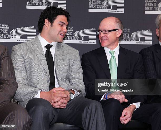 New York Jets quarterback Mark Sanchez and New York Jets Chairman & CEO Woody Johnson attend the New York Giants and Jets send-off ceremony for the...