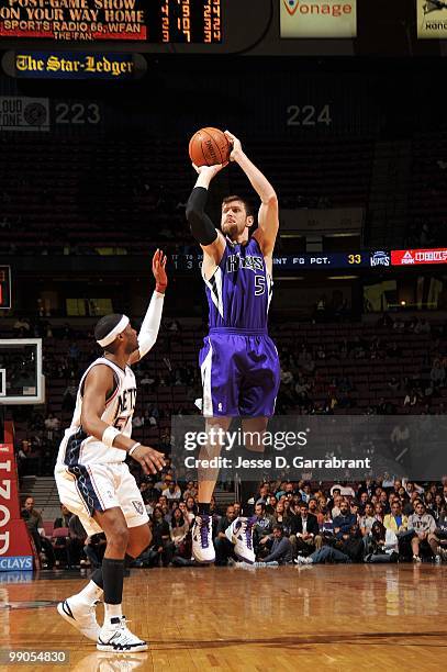 Andres Nocioni of the Sacramento Kings make a jumpshot against the New Jersey Nets during the game at the IZOD Center on March 24, 2010 in East...