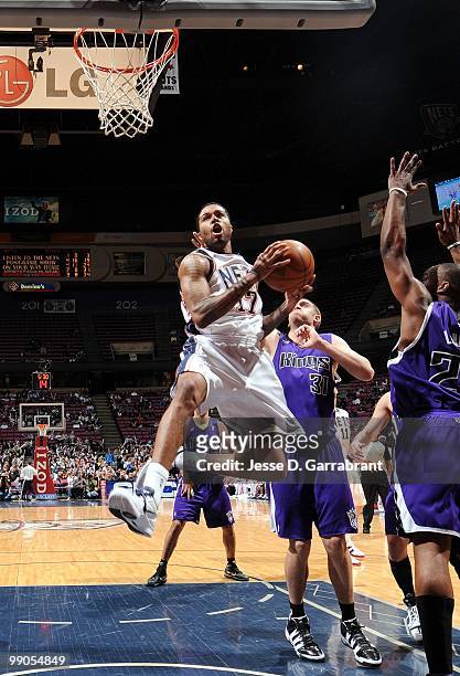 Chris Douglas-Roberts of the New Jersey Nets makes a layup against the Sacramento Kings during the game at the IZOD Center on March 24, 2010 in East...