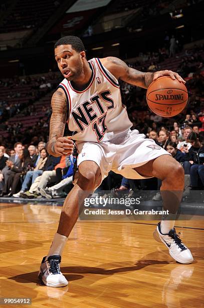 Chris Douglas-Roberts of the New Jersey Nets dribbles the ball against the Sacramento Kings during the game at the IZOD Center on March 24, 2010 in...