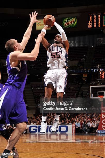Keyon Dooling of the New Jersey Nets puts a shot up against the Sacramento Kings during the game at the IZOD Center on March 24, 2010 in East...