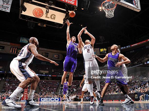 Spencer Hawes of the Sacramento Kings makes a layup against the New Jersey Nets during the game at the IZOD Center on March 24, 2010 in East...