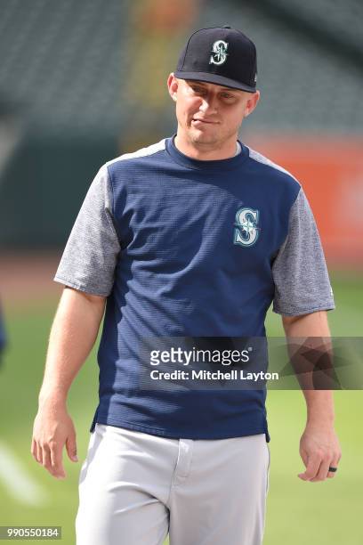 Kyle Seager of the Seattle Mariners looks on during batting practice of a baseball game against the Baltimore Orioles at Oriole Park at Camden Yards...