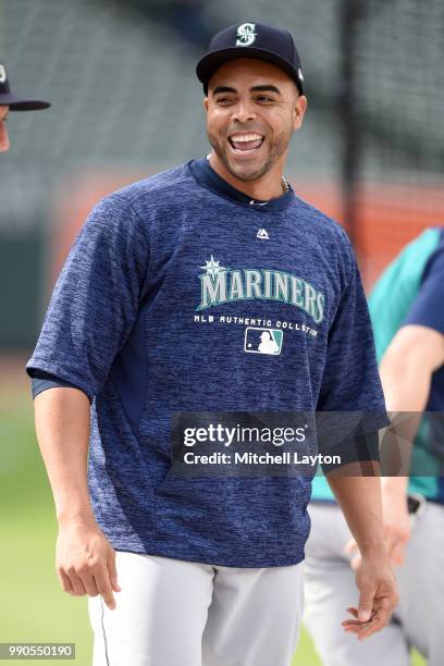 Nelson Cruz of the Seattle Mariners looks on during batting practice of a baseball game against the Baltimore Orioles at Oriole Park at Camden Yards...