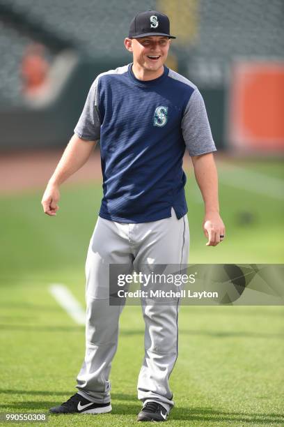 Kyle Seager of the Seattle Mariners looks on during batting practice of a baseball game against the Baltimore Orioles at Oriole Park at Camden Yards...