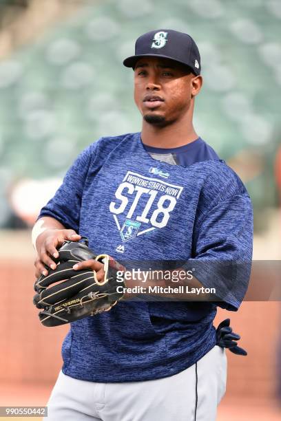 Jean Segura of the Seattle Mariners warms up during batting practice of a baseball game against the Baltimore Orioles at Oriole Park at Camden Yards...