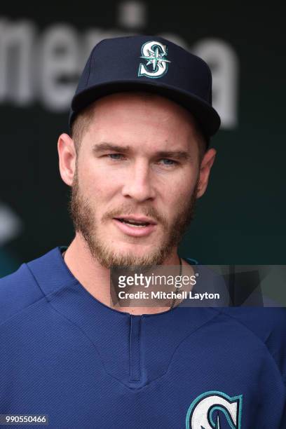 Chris Herrmann of the Seattle Mariners looks on during batting practice of a baseball game against the Baltimore Orioles at Oriole Park at Camden...