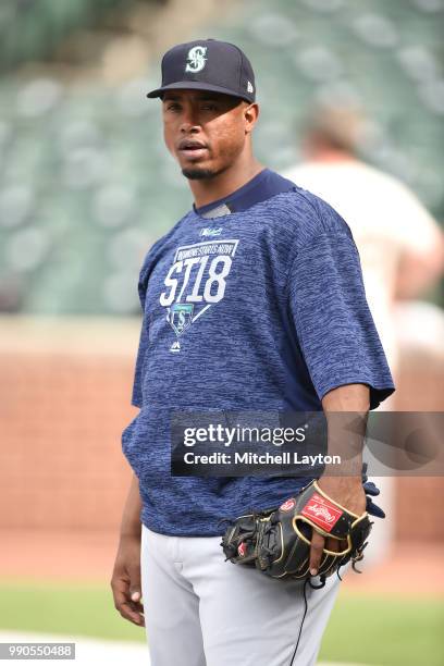 Jean Segura of the Seattle Mariners warms up during batting practice of a baseball game against the Baltimore Orioles at Oriole Park at Camden Yards...