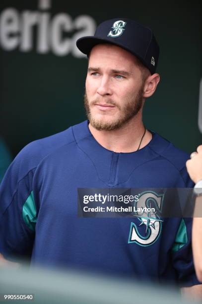 Chris Herrmann of the Seattle Mariners looks on during batting practice of a baseball game against the Baltimore Orioles at Oriole Park at Camden...