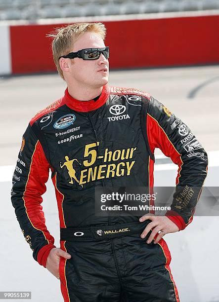 Steve Wallace, driver of the 5-hour Energy Toyota, looks on during qualifying for the NASCAR Nationwide series Royal Purple 200 presented by O'Reilly...