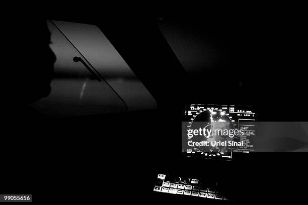Greek coastguard officer studies a radar as his boat patrols along the shore of the island of Lesbos on May 4, 2010 Lesbos, Greece. Greece has become...