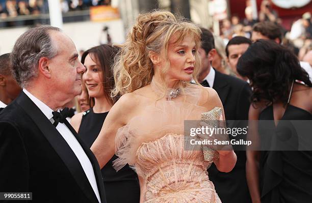 French Culture Minister Frederic Mitterrand and actress Arielle Dombasle attend the "Robin Hood" Premiere at the Palais des Festivals during the 63rd...