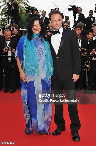 Iranian director Marjane Satrapi and French actor Vincent Perez attend the 'Robin Hood' Premiere at the Palais De Festivals during the 63rd Annual...