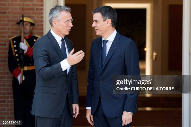 Spanish Prime Minister Pedro Sanchez welcomes NATO General Secretary Jens Stoltenberg at the Moncloa palace in Madrid on July 3, 2018.
