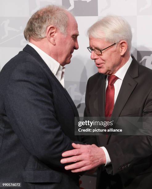 German Football League president Reinhard Rauball greets president of FC Bayern Munich, Uli Hoeness at the German Football League New Year's...